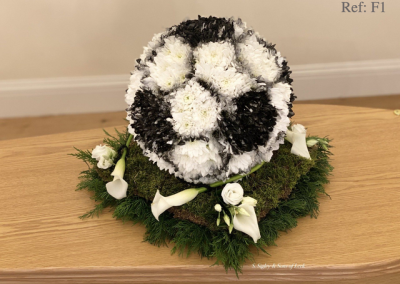 Football funeral flowers.